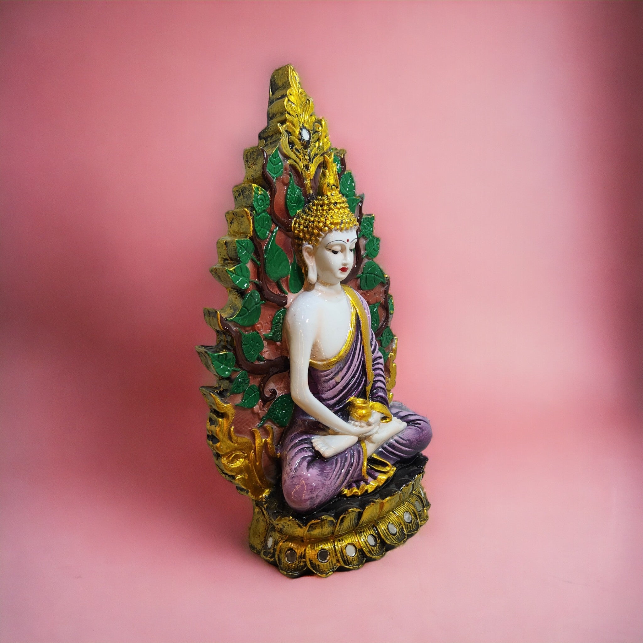 Unique Buddha statue with leaf background