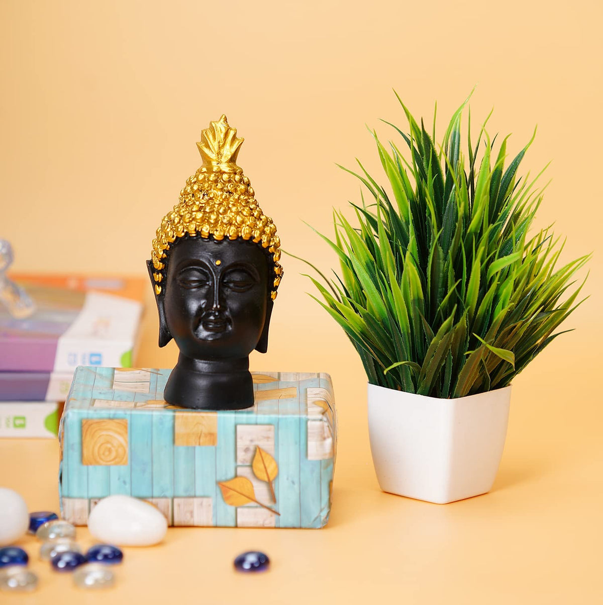 Artificial grass plant with buddha statue