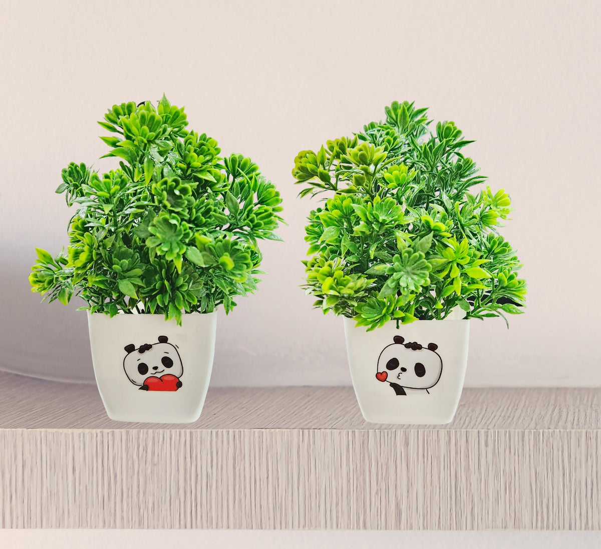 Artificial small green plant with cute bear emoji